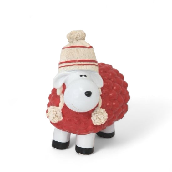 Deko Schaf mit Bommelmütze Rot aus Kunstharz – winterliche Tierfigur für Haus und Weihnachtsdekoration