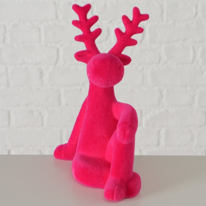 Figur Timor sitzend – moderner Deko Hirsch in Pink mit beflockter Oberfläche