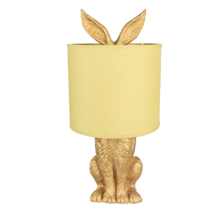 Tischlampe Kaninchen – dekorative Designlampe aus Polyresin in Gold mit gelbem Lampenschirm