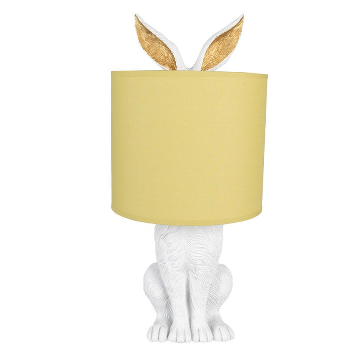 Tischlampe Kaninchen – dekorative Designlampe aus Polyresin in Weiß mit gelbem Lampenschirm