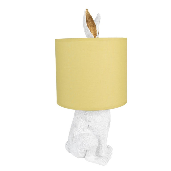 Tischlampe Kaninchen – dekorative Designlampe aus Polyresin in Weiß mit gelbem Lampenschirm