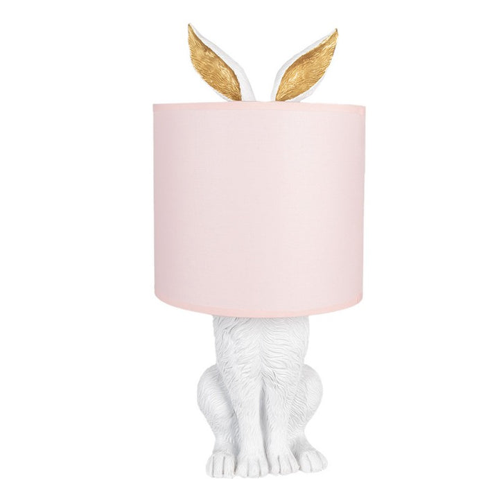 Tischlampe Kaninchen – elegante Designlampe aus Polyresin in Weiß mit rosafarbenem Lampenschirm
