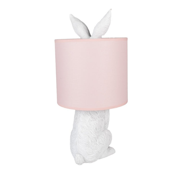 Tischlampe Kaninchen – elegante Designlampe aus Polyresin in Weiß mit rosafarbenem Lampenschirm