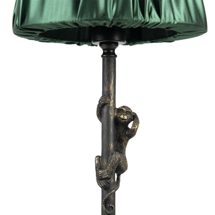 Tischlampe Affe – elegante Designlampe aus Polyresin in Braun und Grün